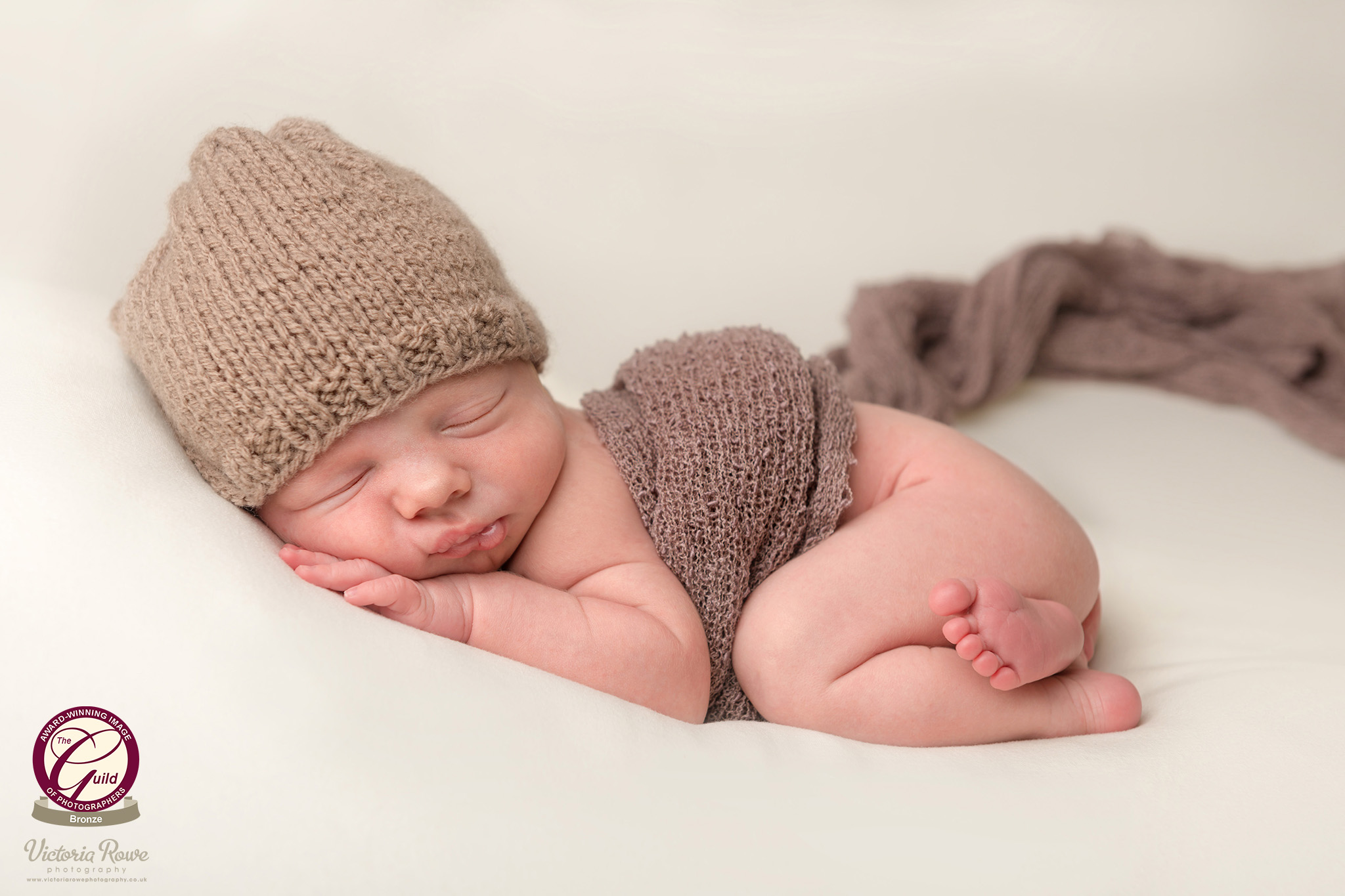 Bronze award winner in the Guild of Photographers' Image of the Month competition for newborn photography